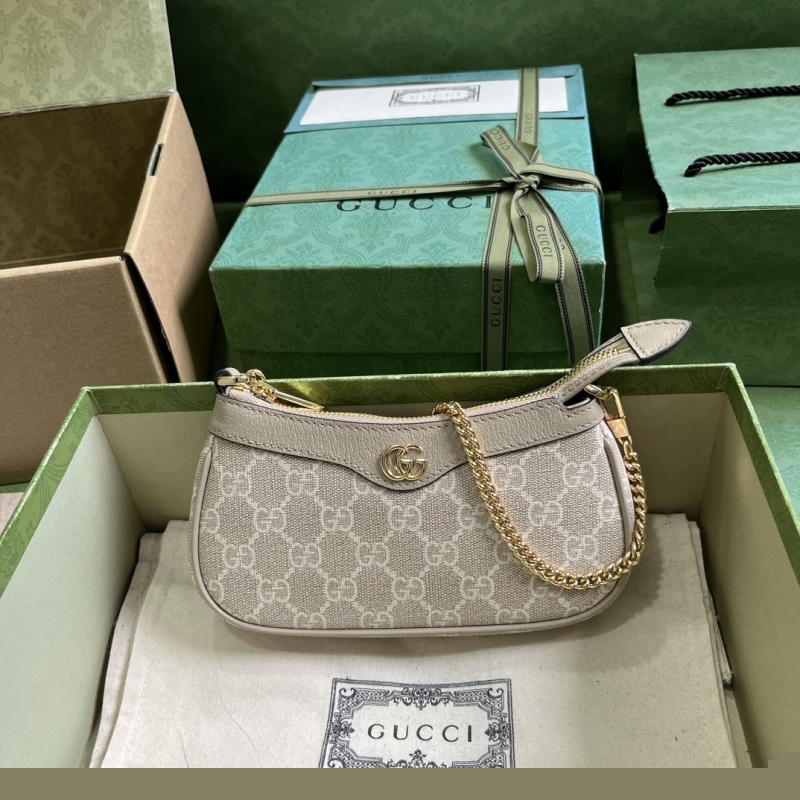 G*u*i top handle bags